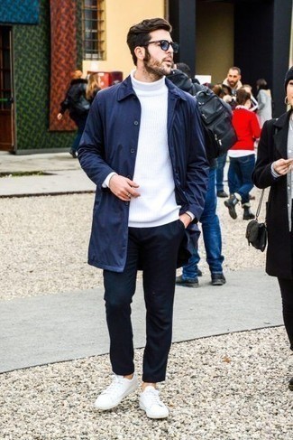 Blue Sunglasses Outfits For Men: If you're all about feeling comfortable when it comes to styling, this combo of a navy raincoat and blue sunglasses will totally vibe with you. A pair of white canvas low top sneakers instantly ramps up the classy factor of any getup.