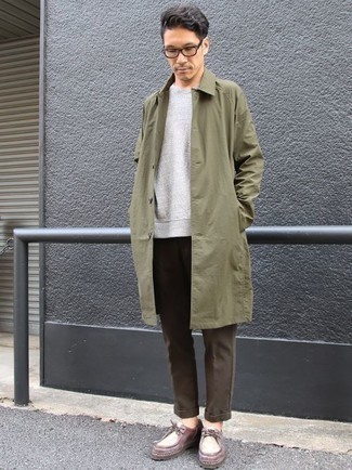 Dark Brown Chinos Outfits: An olive raincoat and dark brown chinos are absolute menswear must-haves that will integrate really well within your casual styling arsenal. A pair of burgundy leather desert boots looks amazing complementing this outfit.