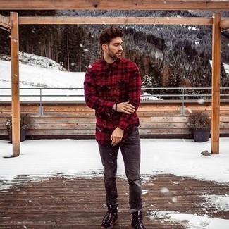 Black Canvas High Top Sneakers Outfits For Men: Uber stylish and functional, this pairing of a red and black plaid long sleeve shirt and charcoal ripped jeans will provide you with variety. Look at how great this look pairs with a pair of black canvas high top sneakers.