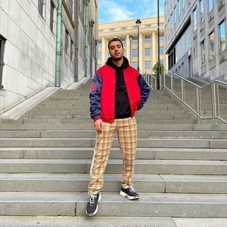 Red and Navy Varsity Jacket Outfits For Men: A red and navy varsity jacket and khaki plaid chinos are a good combination worth incorporating into your day-to-day routine. Power up this look with black and white athletic shoes.