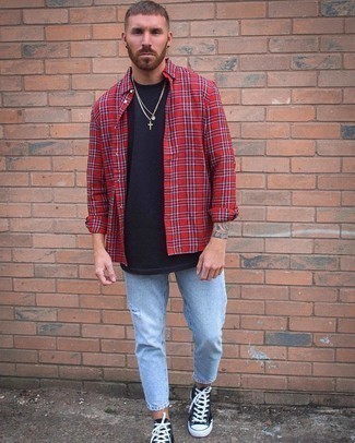Red and White Plaid Long Sleeve Shirt Outfits For Men: A red and white plaid long sleeve shirt and light blue ripped jeans are a cool combination worth integrating into your casual rotation. Black and white canvas high top sneakers are a never-failing footwear style that's full of character.
