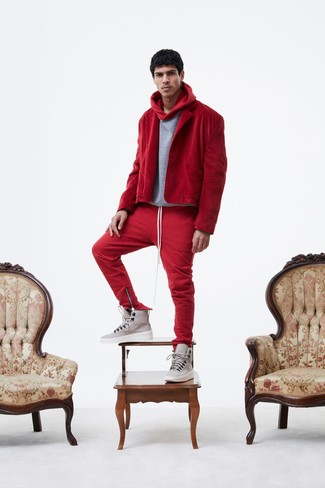 Red Corduroy Blazer Outfits For Men: Consider teaming a red corduroy blazer with red sweatpants for an off-duty and trendy look. Add beige leather high top sneakers to the mix to infuse a sense of stylish effortlessness into this getup.