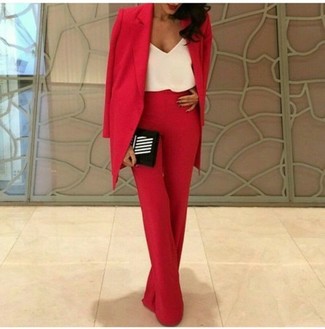 Red Wide Leg Pants Outfits: This combination of a red blazer and red wide leg pants is truly impactful, but it's also very easy to replicate.