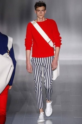Men's Red Crew-neck Sweater, Black and White Vertical Striped Chinos, White Low Top Sneakers, White Canvas Messenger Bag