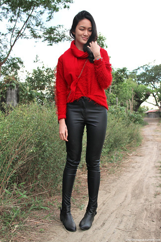 Red Crew-neck Sweater Outfits For Women: This pairing of a red crew-neck sweater and black leather skinny pants is the ideal balance between casual and chic. Complement this outfit with a pair of black leather ankle boots for a trendy hi-low mix.