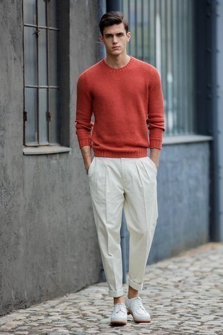 Red Crew-neck Sweater Outfits For Men: Teaming a red crew-neck sweater and white dress pants will cement your styling savvy. Complement your outfit with white leather derby shoes and you're all done and looking amazing.
