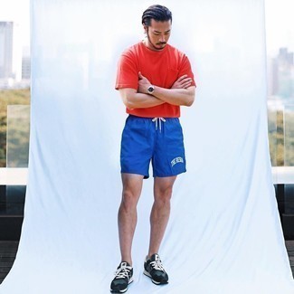 Navy Sports Shorts Outfits For Men: Go for a red crew-neck t-shirt and navy sports shorts for an urban and trendy look. Navy and white athletic shoes are a smart option to round off your look.