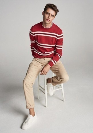 Red Sweater Outfits For Men: Master the casually stylish look in a red sweater and khaki chinos. A great pair of white canvas low top sneakers is an easy way to add a little kick to the outfit.