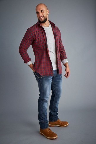 Dark Brown Suede Work Boots Outfits For Men: This is solid proof that a red plaid long sleeve shirt and navy jeans look awesome when you pair them together in a relaxed menswear style. Send an otherwise traditional look a whole other path with a pair of dark brown suede work boots.