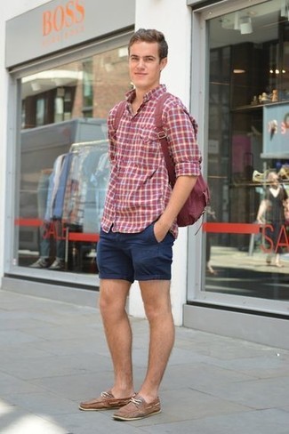 Beige Boat Shoes Outfits: This relaxed pairing of a red gingham long sleeve shirt and navy shorts is extremely easy to throw together without a second thought, helping you look awesome and prepared for anything without spending a ton of time combing through your closet. Let your styling sensibilities truly shine by finishing your outfit with a pair of beige boat shoes.