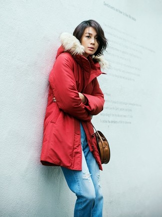 1200+ Cold Weather Outfits For Women: You'll be surprised at how very easy it is to put together this casual ensemble. Just a red parka and blue ripped boyfriend jeans.