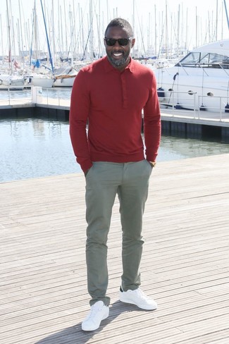 Idris Elba wearing Red Polo, Grey Chinos, White Leather Low Top Sneakers