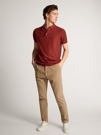 Red Polo Outfits For Men: This combination of a red polo and khaki chinos is extremely easy to put together and so comfortable to work as well! A cool pair of white leather low top sneakers ties this outfit together.