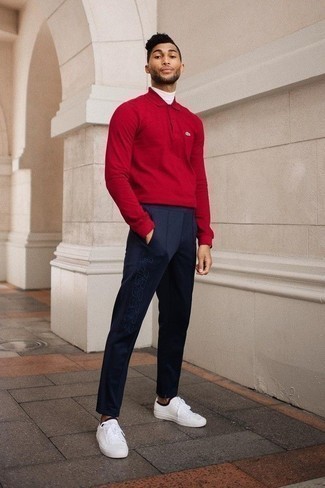 Red Polo Neck Sweater Outfits For Men: This combo of a red polo neck sweater and navy chinos is truly a statement-maker. If you want to instantly dial down your look with shoes, complement your ensemble with a pair of white and black canvas low top sneakers.