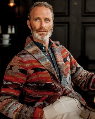 Red Print Shawl Cardigan Outfits For Men: Loving how this pairing of a red print shawl cardigan and beige dress pants instantly makes any gent look polished and sharp.