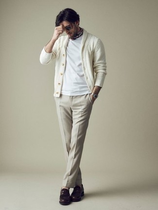 Multi colored Bandana Outfits For Men: Who said you can't make a stylish statement with a laid-back outfit? Draw the attention in a white shawl cardigan and a multi colored bandana. Level up this look with the help of a pair of dark brown leather loafers.