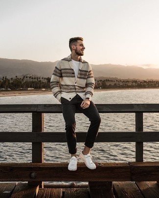 Beige Shawl Cardigan Outfits For Men: Try teaming a beige shawl cardigan with dark brown chinos to assemble a casually classic and modern-looking outfit. Got bored with this getup? Let a pair of white leather low top sneakers mix things up a bit.