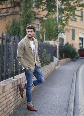 Tan Cardigan Outfits For Men: This casual combo of a tan cardigan and blue ripped jeans is super easy to put together without a second thought, helping you look on-trend and ready for anything without spending a ton of time digging through your wardrobe. Inject an element of polish into your ensemble by finishing with a pair of brown leather monks.
