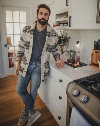 Grey Fair Isle Shawl Cardigan Outfits For Men: Try pairing a grey fair isle shawl cardigan with blue jeans for a casually edgy and trendy look. On the fence about how to finish off? Make grey suede low top sneakers your footwear choice to spice things up.