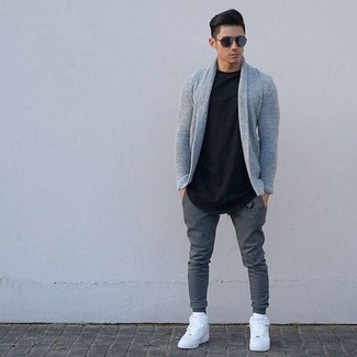 Grey Shawl Cardigan Outfits For Men: Combining a grey shawl cardigan and charcoal sweatpants will allow you to flaunt your skills in menswear styling even on lazy days. Rounding off with a pair of white leather high top sneakers is an effective way to infuse a more relaxed touch into your look.