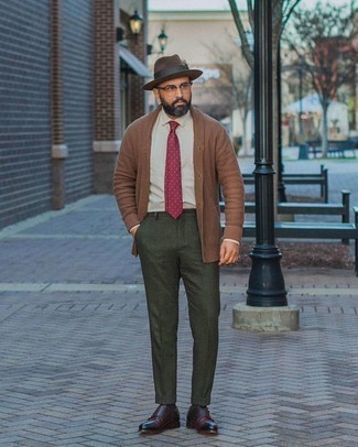 Shawl Cardigan Outfits For Men: A shawl cardigan looks so elegant when paired with dark green dress pants for an outfit worthy of a complete gent. When it comes to footwear, this look is finished off well with burgundy leather double monks.