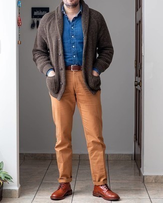 Brown Shawl Cardigan Outfits For Men: This combination of a brown shawl cardigan and tobacco chinos couldn't possibly come across as anything other than incredibly dapper and effortlessly classic. Tobacco leather brogue boots will infuse a hint of refinement into an otherwise simple outfit.
