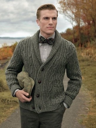 Dark Brown Plaid Bow-tie Outfits For Men: An olive shawl cardigan and a dark brown plaid bow-tie are a perfect combination to be utilised on lazy days.