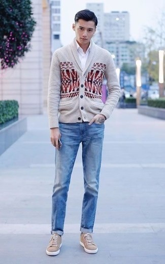 Tan Shawl Cardigan Outfits For Men: If you're hunting for a casual and at the same time dapper getup, go for a tan shawl cardigan and light blue jeans. Bring a relaxed twist to this outfit by rocking a pair of tan canvas low top sneakers.