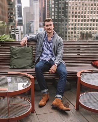 Grey Shawl Cardigan Outfits For Men: Go for a straightforward but cool and relaxed option in a grey shawl cardigan and navy jeans. A cool pair of tobacco suede desert boots pulls this look together.