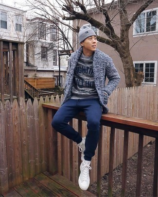 Navy Shawl Cardigan Outfits For Men: This pairing of a navy shawl cardigan and navy sweatpants is proof that a straightforward casual ensemble can still be really interesting. Take this ensemble in a whole other direction by finishing off with white canvas high top sneakers.
