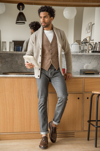 Grey Jeans Outfits For Men: One of the coolest ways for a man to style out a beige shawl cardigan is to wear it with grey jeans in an off-duty getup. For something more on the elegant end to complete this ensemble, complement your getup with dark brown leather brogues.