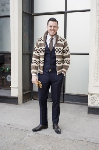 Beige Fair Isle Cardigan Outfits For Men: Putting together a beige fair isle cardigan and navy dress pants is a fail-safe way to infuse your styling arsenal with some manly elegance. Rounding off with black leather oxford shoes is a surefire way to add some extra definition to this getup.