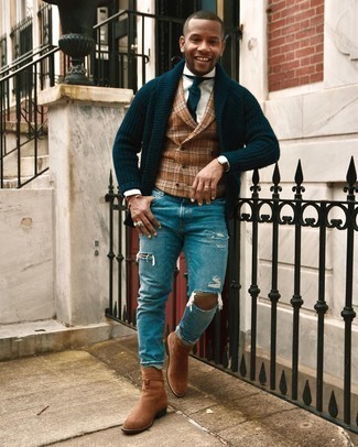 Tobacco Waistcoat Outfits: Why not try teaming a tobacco waistcoat with blue ripped jeans? As well as very functional, these two pieces look amazing when worn together. A trendy pair of brown suede chelsea boots is an effective way to infuse an added touch of style into this getup.