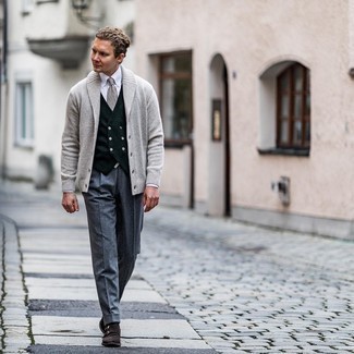 Charcoal Wool Dress Pants Outfits For Men: Marrying a grey shawl cardigan and charcoal wool dress pants is a guaranteed way to inject your day-to-day arsenal with some masculine elegance. Complement this look with dark brown suede double monks and the whole outfit will come together.