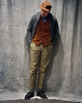 Brown Waistcoat Outfits: Wear a brown waistcoat and olive chinos to be the picture of polished men's fashion. For something more on the cool and casual side to complement this look, introduce a pair of black leather desert boots to the mix.
