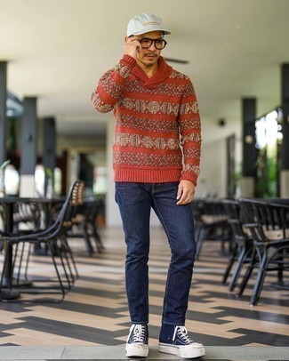 Shawl-Neck Sweater Outfits: A big yes to this off-duty pairing of a shawl-neck sweater and navy jeans! Bring a playful touch to this look by sporting navy and white canvas high top sneakers.