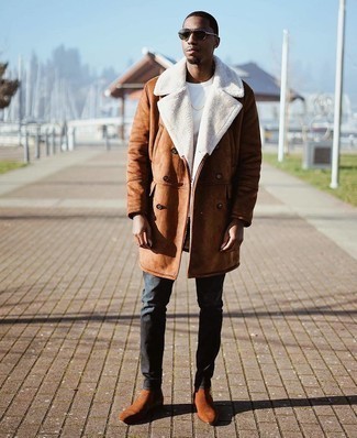 500+ Winter Outfits For Men: Wear a brown shearling coat and navy jeans to create a daily ensemble that's full of style and personality. Polish up this getup with brown suede chelsea boots. Planning a killer outfit can be a bit difficult at times on its own. Enter extra cold temps into the equation, and the whole thing becomes even more difficult. No worries, this here is your winter fashion inspo.