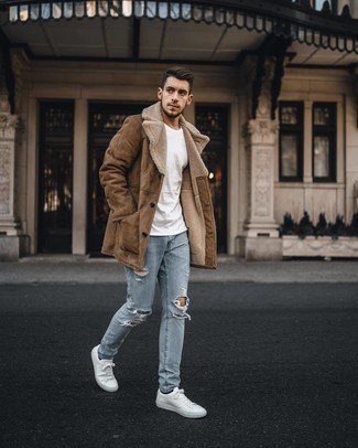 Dark Brown Shearling Coat Outfits For Men: To create a laid-back outfit with a twist, you can easily rock a dark brown shearling coat and light blue ripped jeans. Introduce a pair of white leather low top sneakers to the equation et voila, the ensemble is complete.