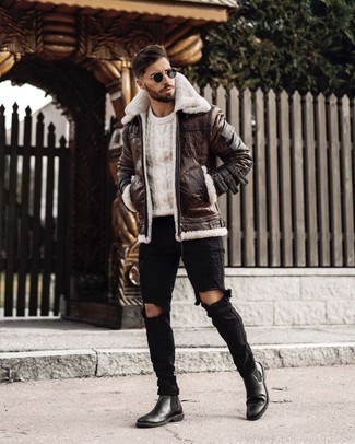 Brown Shearling Jacket Outfits For Men: Pair a brown shearling jacket with black ripped jeans and you'll be prepared for wherever this day takes you. Why not complement this getup with black leather chelsea boots for an element of class?