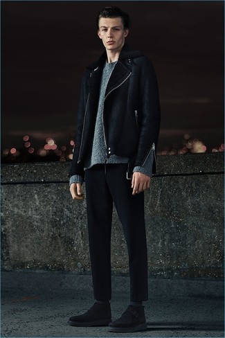 Black and White Shearling Jacket Outfits For Men: This casual pairing of a black and white shearling jacket and black chinos is a real lifesaver when you need to look nice but have no time. Add black suede desert boots to this outfit and off you go looking killer.