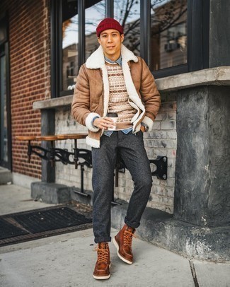 Shearling Jacket Outfits For Men: When the setting allows casual styling, you can easily rock a shearling jacket and charcoal wool chinos. When in doubt as to what to wear when it comes to shoes, complete your look with a pair of brown leather casual boots.