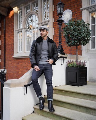 500+ Winter Outfits For Men: A black shearling jacket and navy skinny jeans are wonderful menswear must-haves that will integrate brilliantly within your daily collection. To give your overall look a more sophisticated touch, add a pair of black leather chelsea boots to this getup. As you can see, this combination is a stark illustration that good style and dressing warmly for winter are not mutually exclusive.