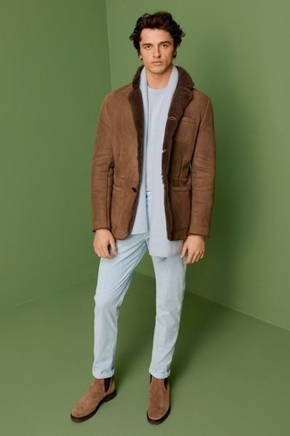 Brown Suede Chelsea Boots Outfits For Men: A brown shearling jacket and light blue chinos are the kind of a foolproof casual getup that you so awfully need when you have zero time to spare. Got bored with this outfit? Enter a pair of brown suede chelsea boots to change things up a bit.