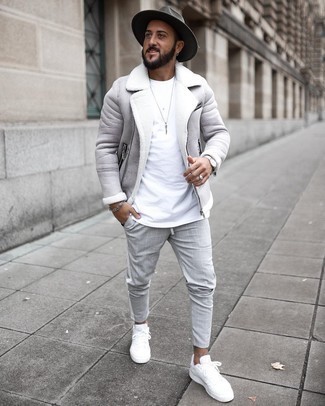 Charcoal Check Chinos Outfits: For a look that's pared-down but can be modified in a multitude of different ways, rock a grey shearling jacket with charcoal check chinos. White canvas low top sneakers are guaranteed to add a hint of stylish effortlessness to your look.