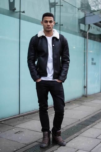 Dark Brown Leather High Top Sneakers Outfits For Men: A black shearling jacket and black jeans teamed together are a wonderful match. Get a bit experimental on the shoe front and dial down your outfit by rocking a pair of dark brown leather high top sneakers.