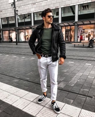 Dark Green Crew-neck T-shirt Outfits For Men: This casually dapper look is easy to break down: a dark green crew-neck t-shirt and white jeans. Complement this outfit with a pair of black and white canvas low top sneakers and the whole getup will come together brilliantly.