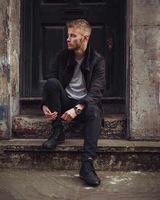 Black Canvas High Top Sneakers Outfits For Men: For a look that delivers comfort and dapperness, rock a dark brown shearling jacket with black skinny jeans. To infuse a dash of stylish effortlessness into this outfit, add black canvas high top sneakers to your outfit.