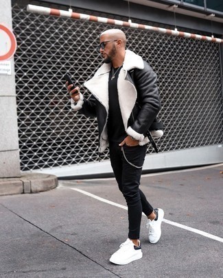 White Studded Leather Low Top Sneakers Outfits For Men: To put together a laid-back ensemble with a modern finish, you can easily rock a black shearling jacket and black skinny jeans. If you're not sure how to round off, add a pair of white studded leather low top sneakers to the equation.