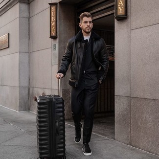 Black Shearling Jacket Outfits For Men: Why not wear a black shearling jacket with black chinos? As well as totally functional, both items look amazing worn together. For something more on the daring side to complement this ensemble, add a pair of black leather low top sneakers to the equation.