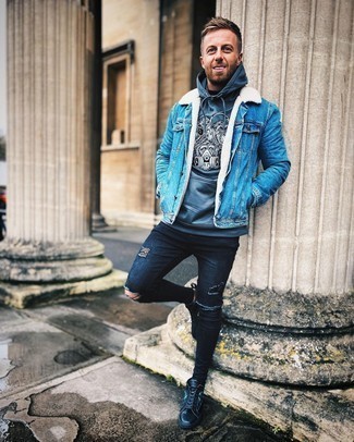 Navy Shearling Jacket Outfits For Men: Try teaming a navy shearling jacket with navy ripped skinny jeans if you're on the lookout for a look idea for when you want to look casual and cool. Why not complement this outfit with black print leather low top sneakers for an added dose of polish?